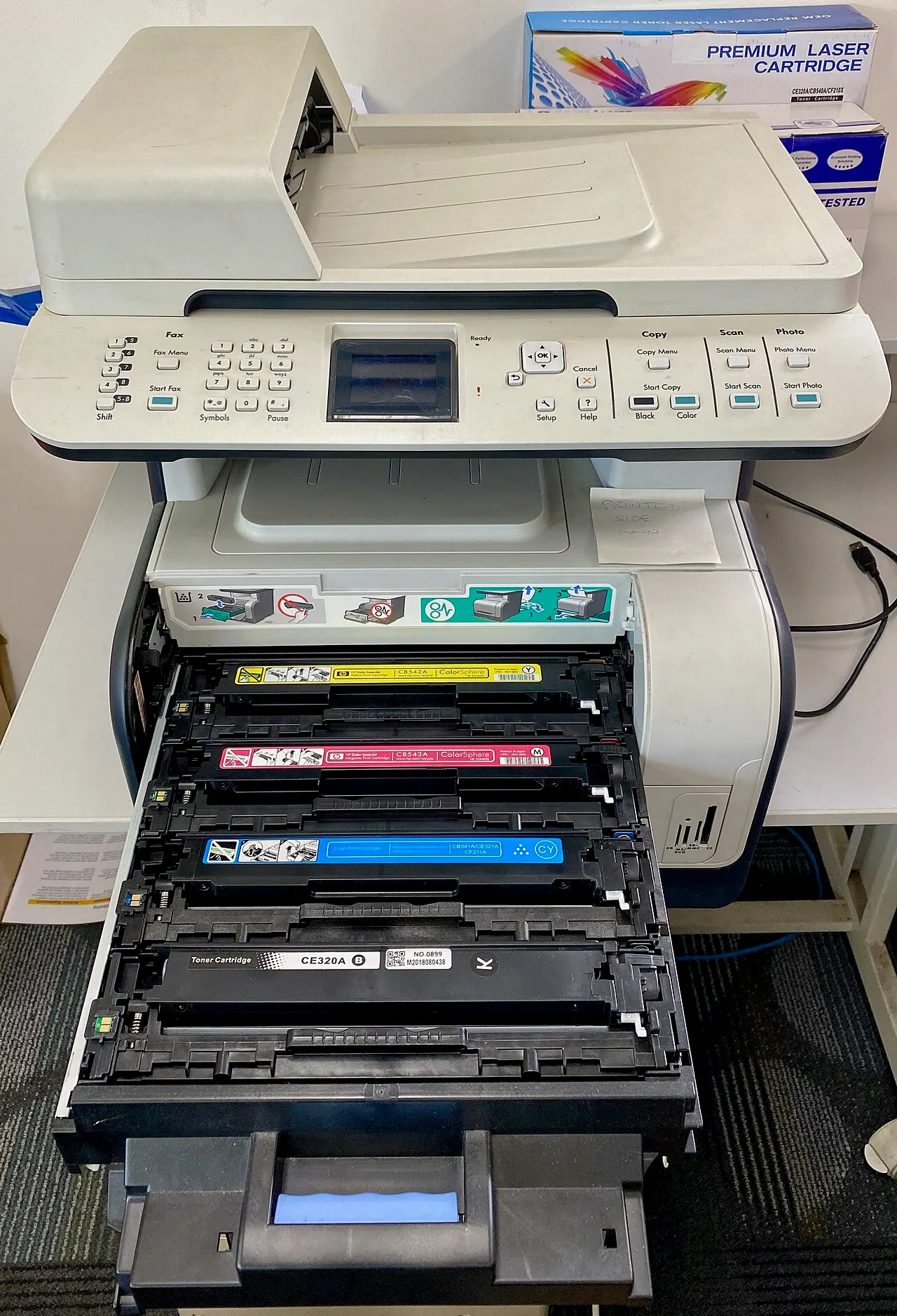 Multifunction printer with toner drawer open for servicing